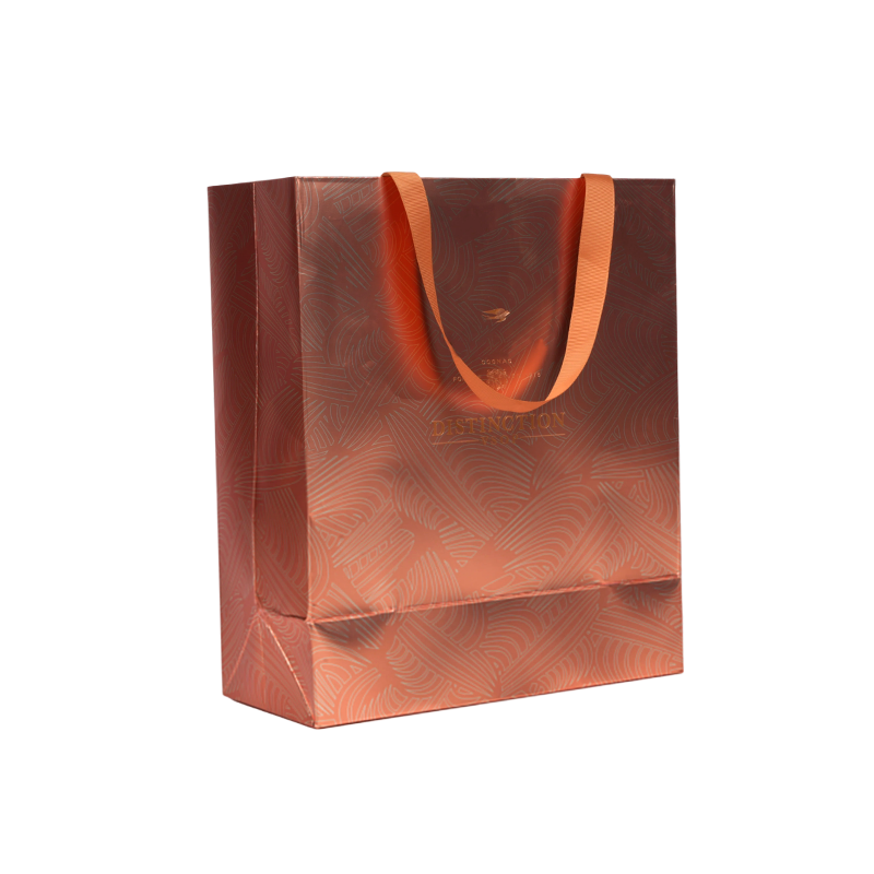 Sac cadeau en papier métallisé or rose